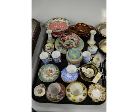 A collection of 19th Century and later cabinet cups, saucers and other ceramics, including: seven Wilmott coffee cans; and a 