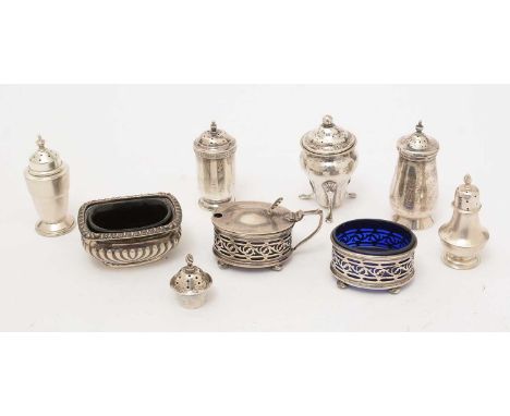 A selection of silver condiments, including: a mustard and matching salt, by T Wilkinson &amp; Sons, Birmingham 1919; a table