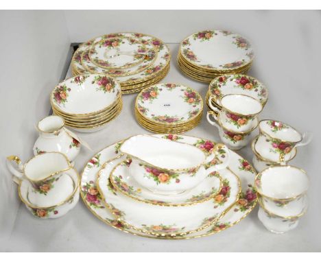 A Royal Albert 'Old Country Roses' dinner and tea service, including: six place settings, cake stand, serving plates, saucebo