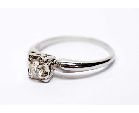 A single stone diamond ring, the brilliant cut diamond weighing approximately 0.30carat, on 14ct white gold shank, ring size 