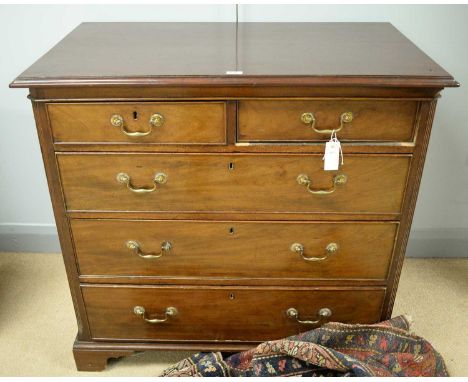 A 19th Century mahogany chest of two short and three long cock-beaded drawers with brass swan neck handles, on square bracket