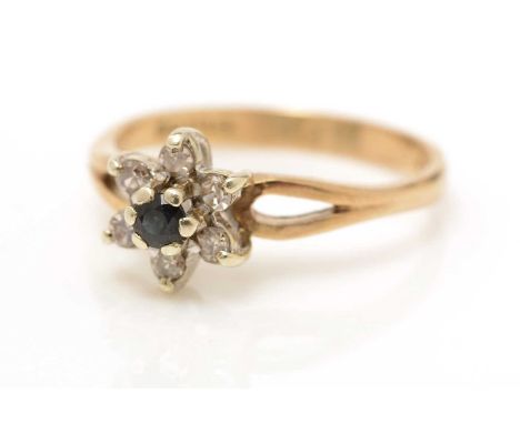 A sapphire and diamond cluster ring, on 9ct yellow gold shank, ring size O, 2.6g gross. 