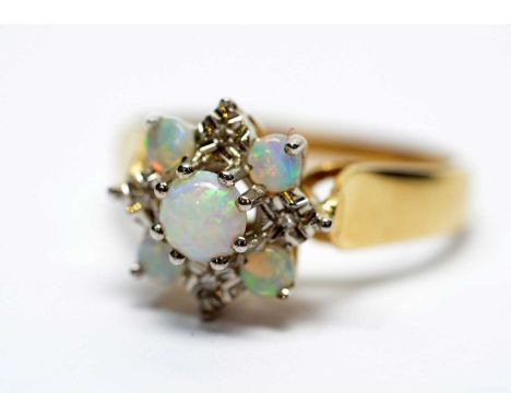 An opal and diamond ring, on 9ct yellow gold shank, ring size P, 3.6g gross.