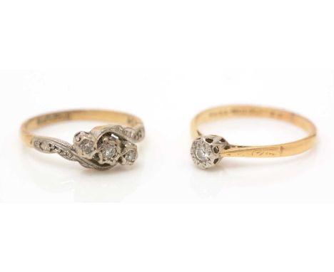 A three stone diamond ring, ring size L; and a single stone diamond ring, ring size M, each shank stamped '18ct Plat', 4.3g g