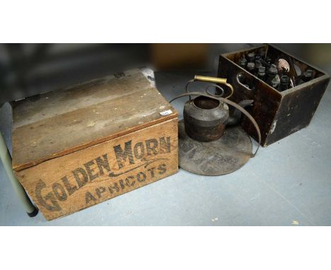 A vintage 'Golden Morn' apricot box; together with a quantity of glass bottles; a cast-iron kettle; and a skillet.