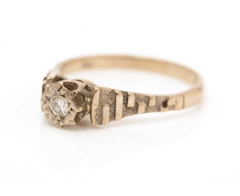 A single stone diamond ring, the brilliant cut diamond in illusion setting, on 18ct yellow gold shank, ring size P, 3.6g gros