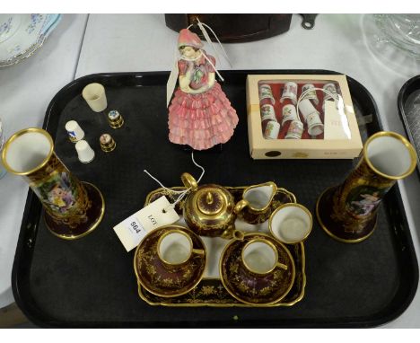 A Royal Doulton figure of 'Maisie', HN1619; together with a Dresden miniature tea service, comprising: teapot, two tea cups a