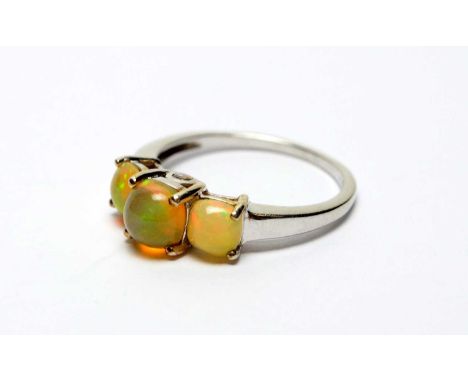 A three stone water opal ring, on 9ct white gold shank, ring size O, 2.5g gross. 