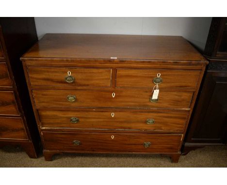 A 19th Century mahogany chest of two short and three long graduated drawers, crossbanded and lined in boxwood, with shield bo