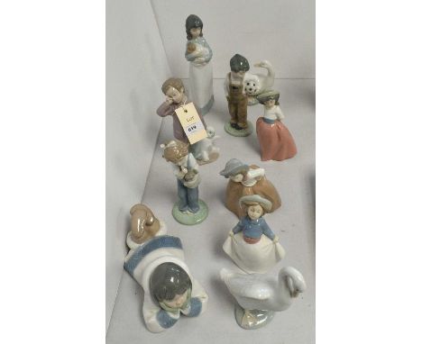 A collection of Nao figurines, various, ten in total, including a recumbent boy and a goose. 