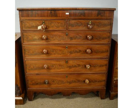 A large Victorian rectangular chest of two short and four cock-beaded drawers, turned knob handles with inlaid mother-of-pear