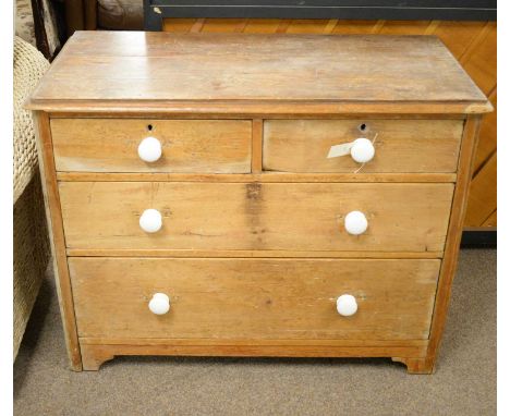 A Victorian stripped pine chest of two short and three long drawers, fitted ceramic handles, 102 x 51 x 79cms high.