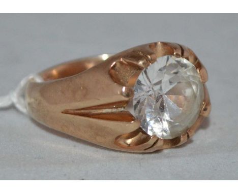 A white sapphire dress ring, the yellow metal mount and shanks stamped '9ct', ring size V, 17.7g gross.