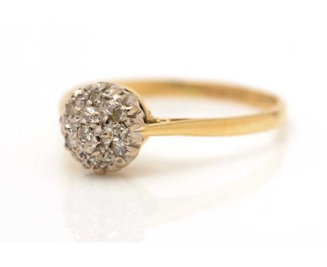 A diamond cluster ring, the eight-cut diamonds in illusion setting on yellow metal shank, ring size P, 2.7g gross. 