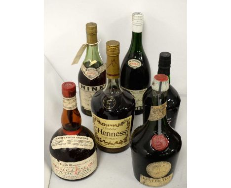 Vintage bottles of Cognac Brandy and Port, including: Hennessy and Benedictine.