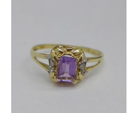 A 9ct gold, amethyst and diamond ring, 1.0g, O