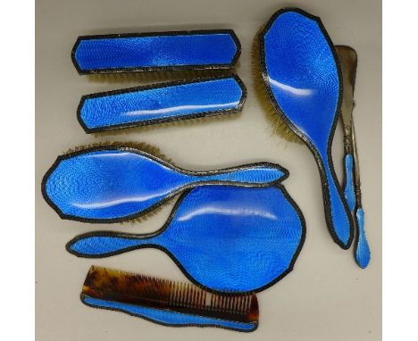 A silver and guilloche enamel eight-piece dressing table set