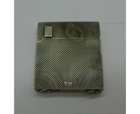 A silver lighter, Birmingham 1931, 32 x 29 x 5mm