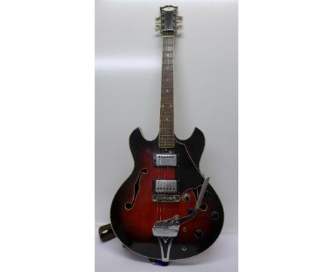 A vintage electric guitar with case