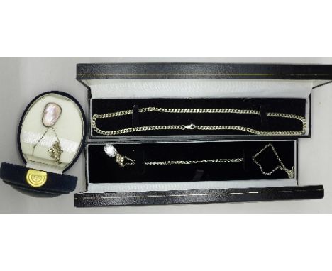 Two silver pendants and chains and a silver chain