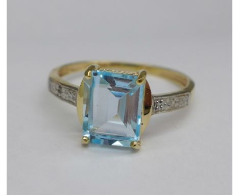 A 9ct gold, blue topaz and diamond ring, 1.7g, O