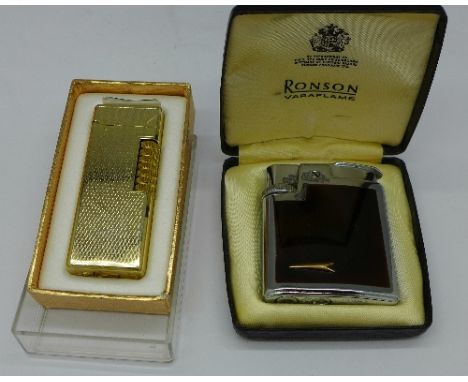 A Ronson Varaflame lighter and a Cosmic lighter, both boxed
