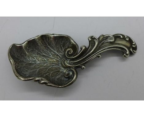 A Victorian silver caddy spoon, hallmark worn, possibly Birmingham 1862