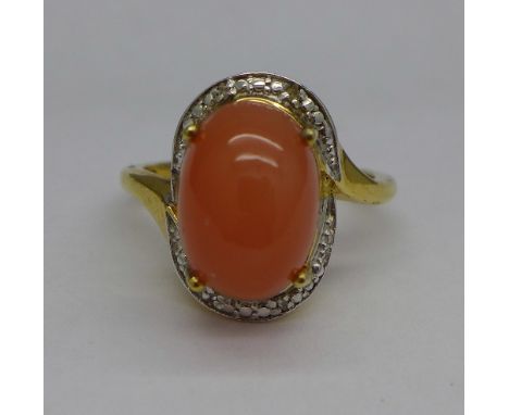 A silver set peach moonstone and diamond ring, P