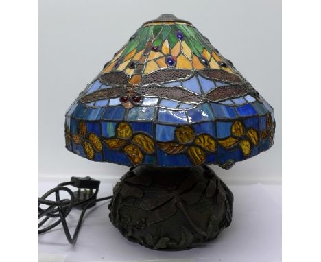 An Art Nouveau style table lamp decorated with dragonflies