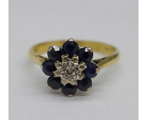 An 18ct gold, sapphire and diamond set ring, 3.4g, N