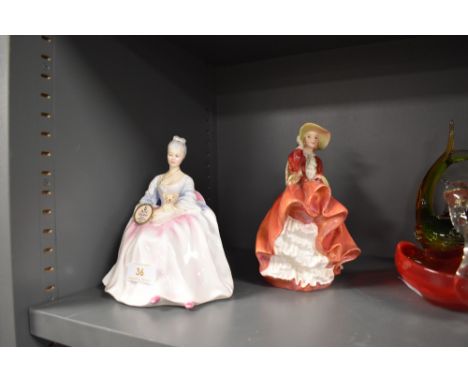Two ceramic figures by Royal Doulton including Charlotte and Top of The Hill
