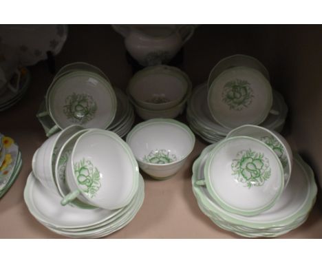 A Royal Albert part tea service in mint green having abstract floral pattern.