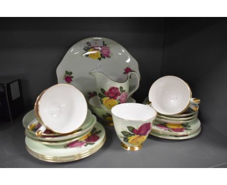 A part tea service by Imperial with floral transfer print