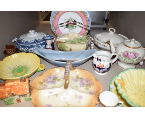 An assorment of vintage ceramics including platters and bowls, jugs,plates, tureens and similar, with makes such as Carlton w