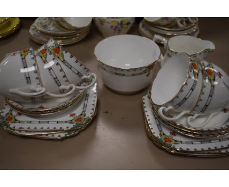 A mid century part tea service having deco hand painted detailing to transfer