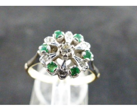 18 ct yellow and white gold emerald and diamond ring. 4.1g. Size N