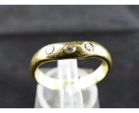 18ct gold three diamond band ring. H colour. Size M.