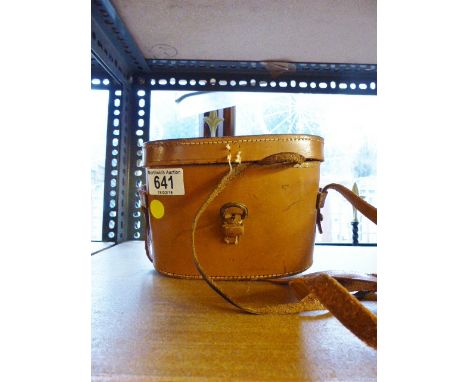Leather cased pair of vintage binoculars