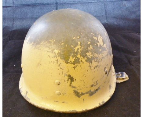 An American military helmet with original liner