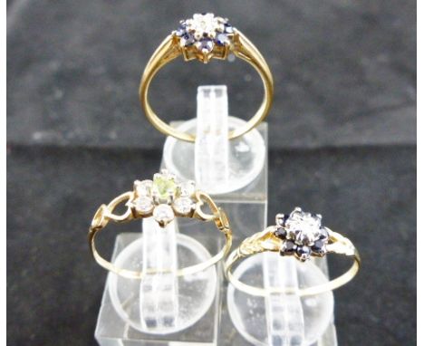 Three vintage stone set rings to include diamonds.