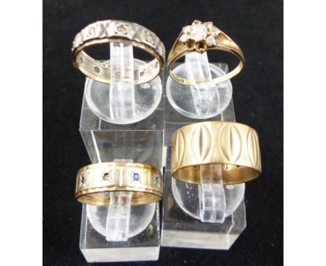 Three 9 ct gold rings, one with some stones missing and a 9 ct gold and silver band. Gross weight 11.56g.