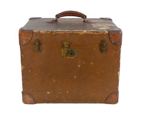 A vintage ladies travelling trunk - brown canvas with leather corners and handle, the cloth interior fitted with a tray and i