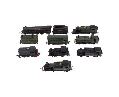 A diesel engine 0-6-0 in green BR livery, together with a number of other locomotives.