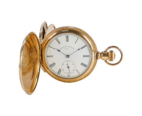 A gilt hunter pocket watch - the engine turned case with armorial, the white enamel dial set out with Roman numerals with a s