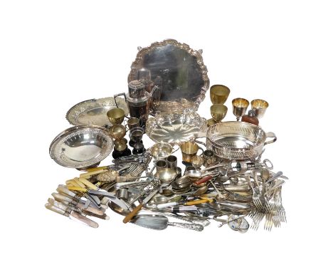 A quantity of silver plate - including a cocktail shaker, a large salver, two bread baskets and a quantity of flatware.