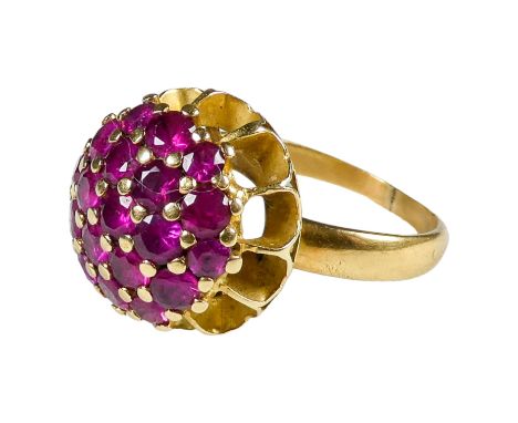An 18ct gold ruby cluster ring - with a domed setting, size L, weight 5.7g.