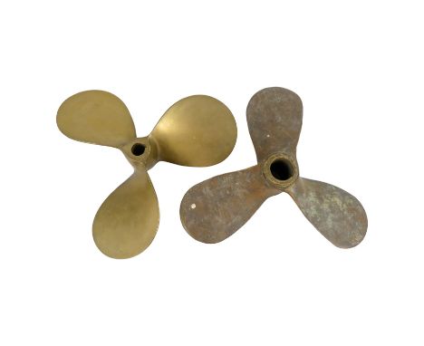 A bronze three blade boat propeller - diameter 32cm, together with another similar older example. (2)