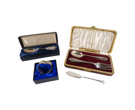 A boxed silver christening set of spoon and fork - Sheffield 1927, together with a heart shaped napkin ring, a commemorative 