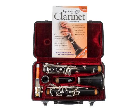 A late 20th century clarinet - by Jupiter, crated and with a beginners guide.
