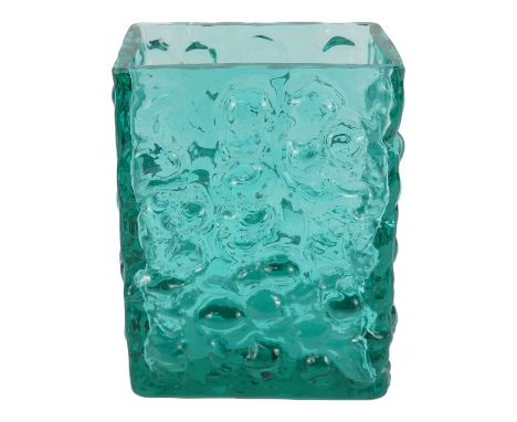 A vintage green glass vase - rectangular with dimpled design, partial label verso, height 12cm.